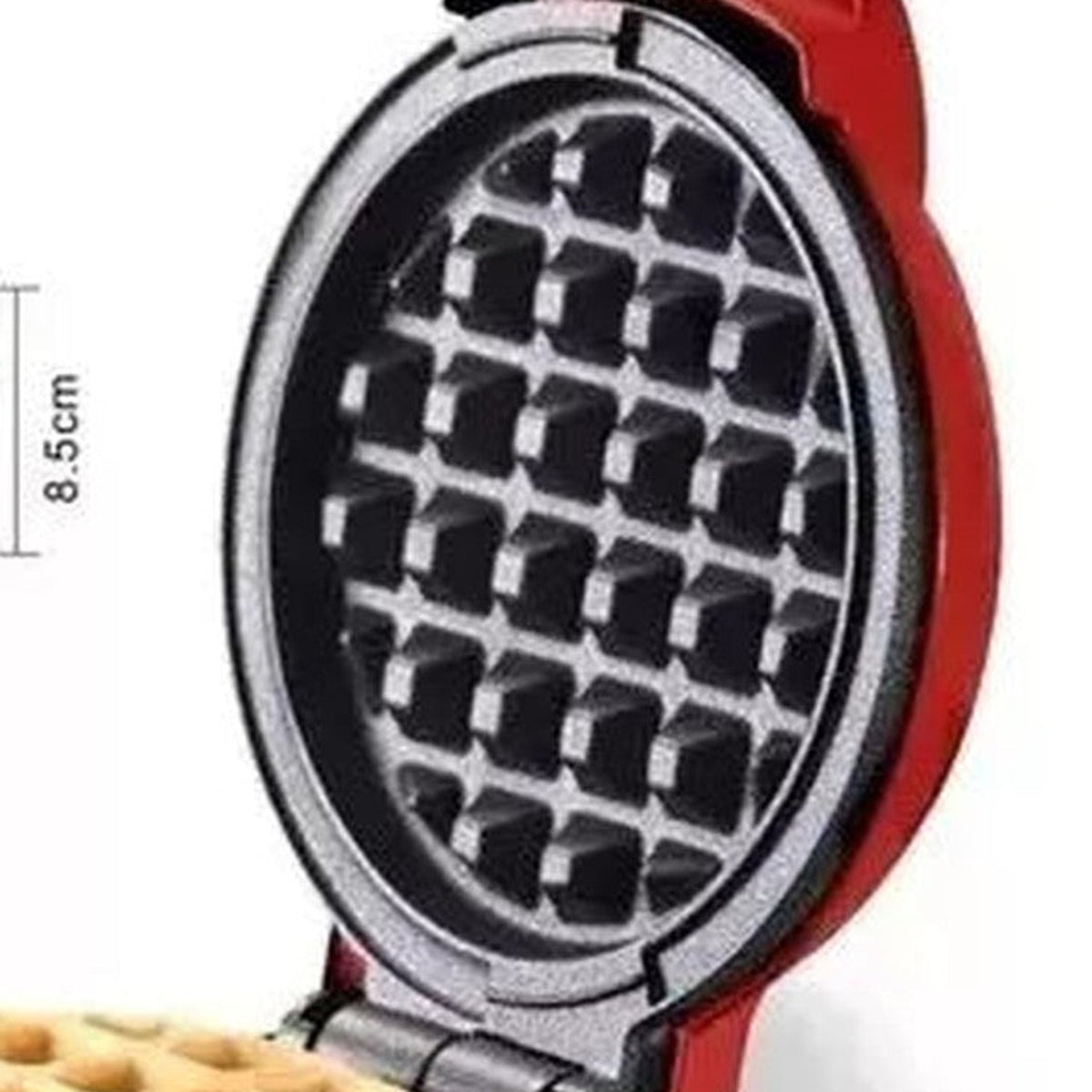 Placa antiadherente de la mini waflera abierta, con molde de waffle clasico